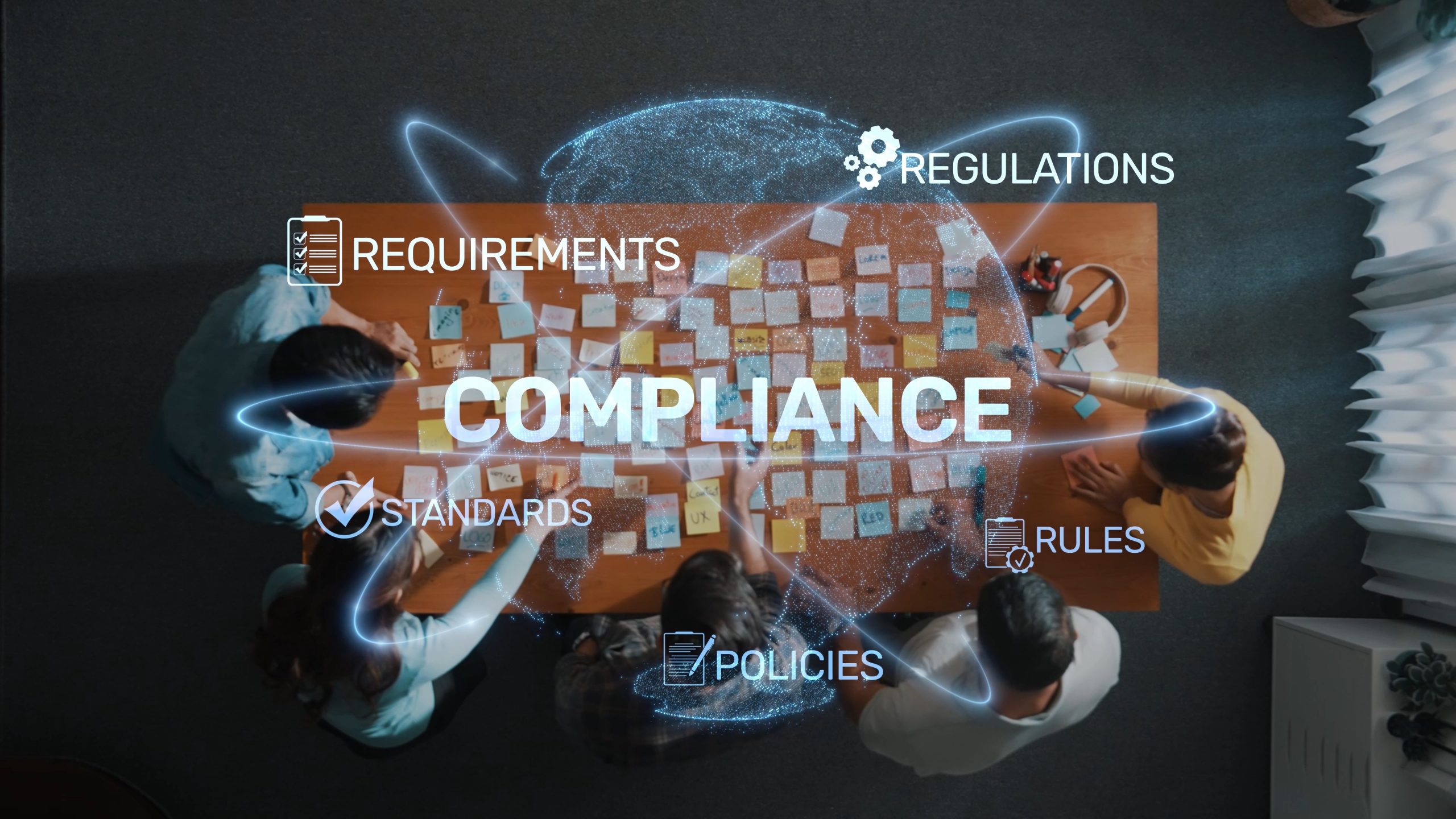 Group Collaboration on Compliance Strategies with Visual Elements of Requirements, Regulations, Standards, Rules, and Policies in a Meeting Room Setting. Raster
